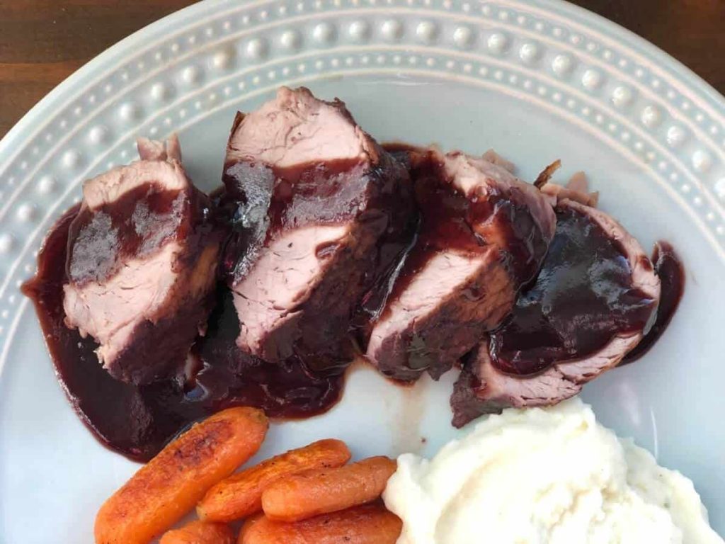 Sliced Blackberry Pork Tenderloin with Blackberry Sauce