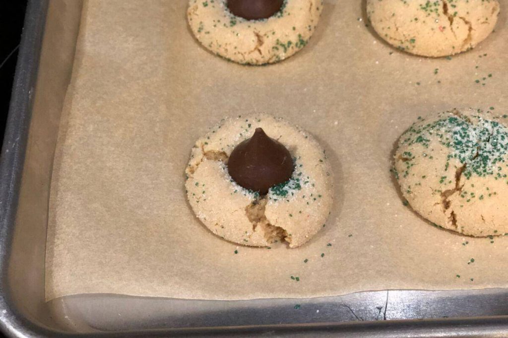 Christmas Hershey's Kiss Cookies placing Hershey Kiss step