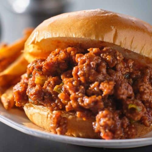 Classic 1950's Sloppy Joe recipe on a toasted bun with french fries and ketchup on the side