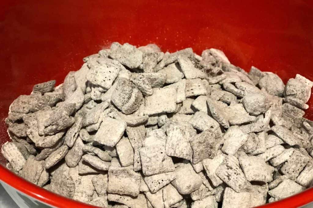 The golden grahams and Corn Chex cereal covered in a dusting of confectioner's sugar