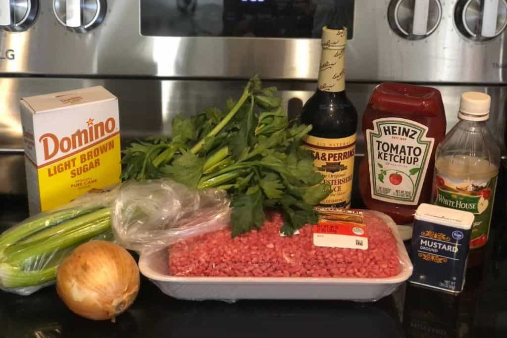 Ingredients for Classic Homemade Sloppy Joes including ground beef, yellow onion, celery, brown sugar, worcestershire sauce, ketchup, vinegar and ground mustard
