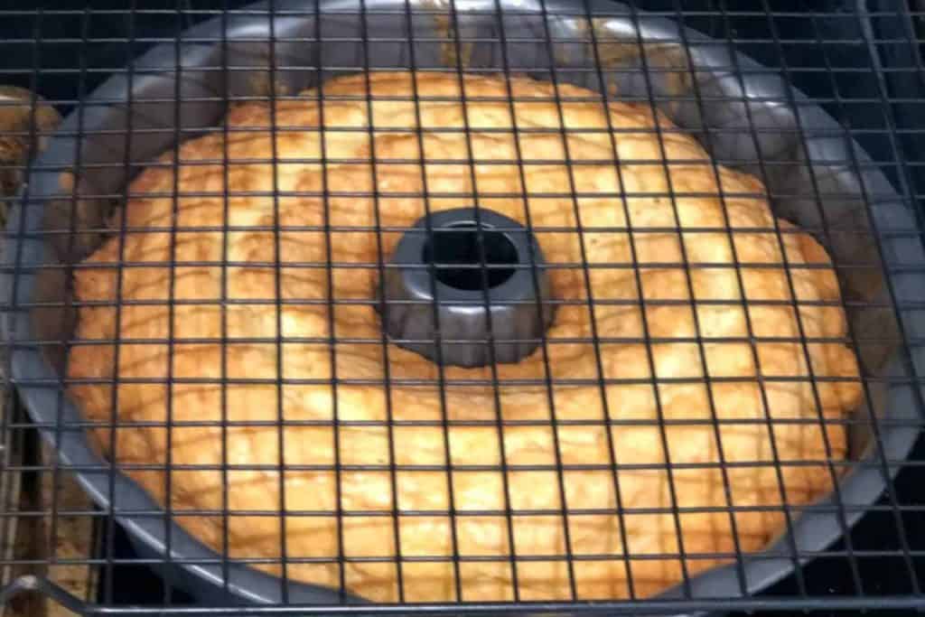 Baked easy Southern lemon pound cake ready to flip over on to the cooling rack