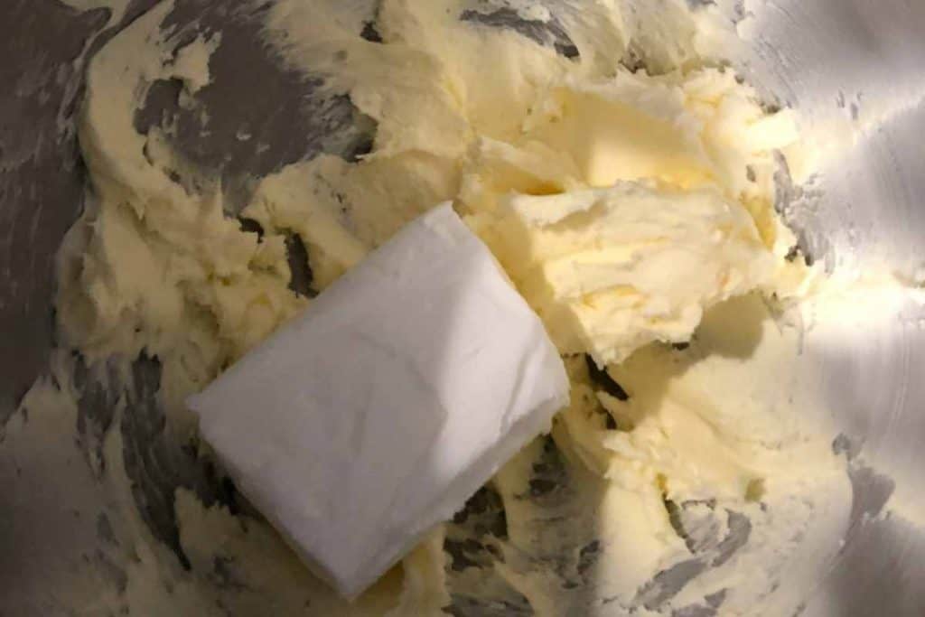 Creamed margarine with a block of vegetable shortening added into the mixing bowl to be creamed together