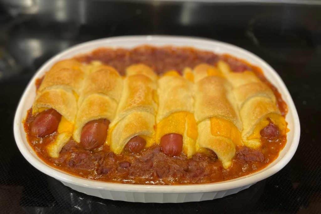 Baked chili dog casserole with crescent rolls fresh out of the oven and ready to eat
