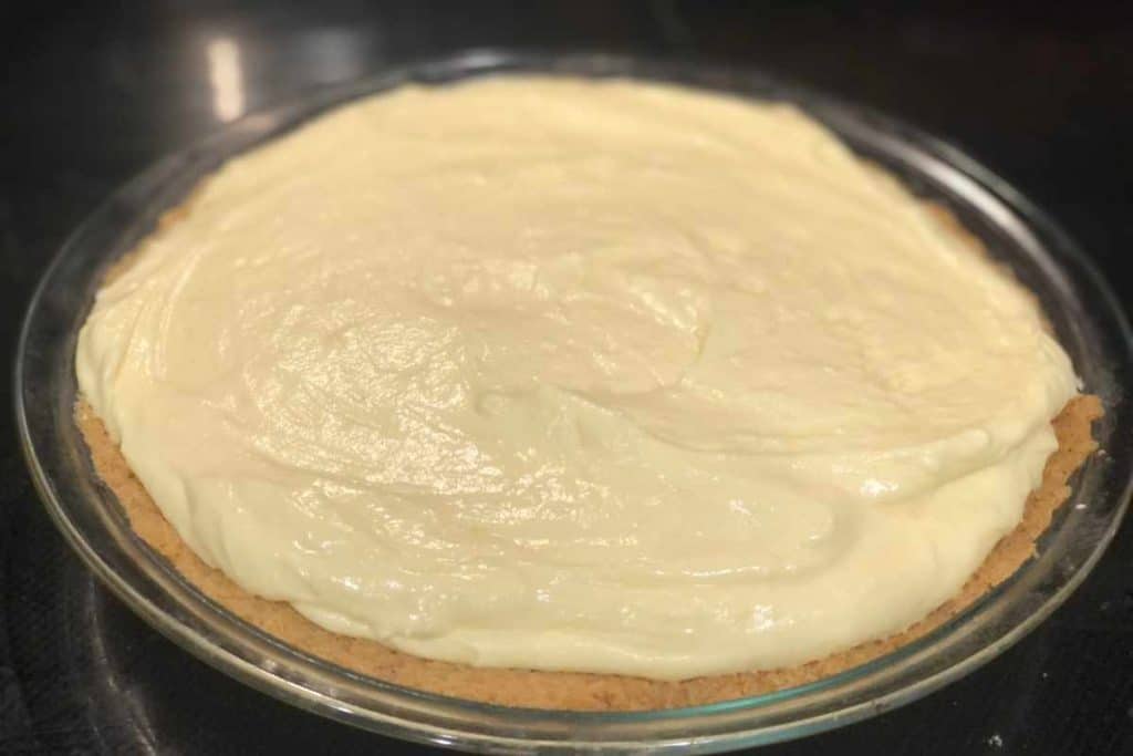 Filling put into the pie crust and smoothed out over the top