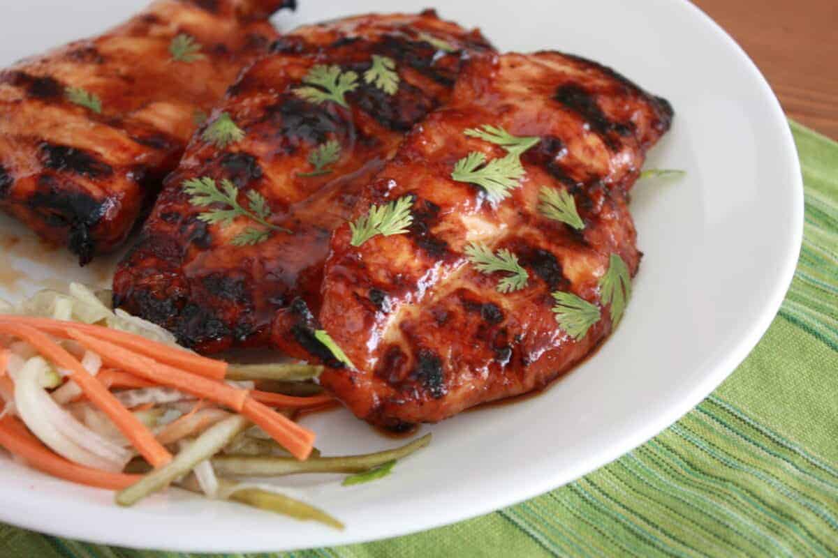 Vietnamese Grilled Chicken on a plate with some slaw salad