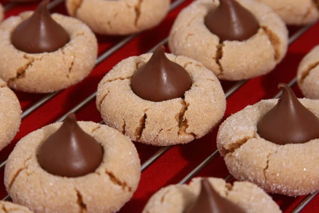 Peanut Blossom Christmas Hershey's Kiss Cookies on cooling rack