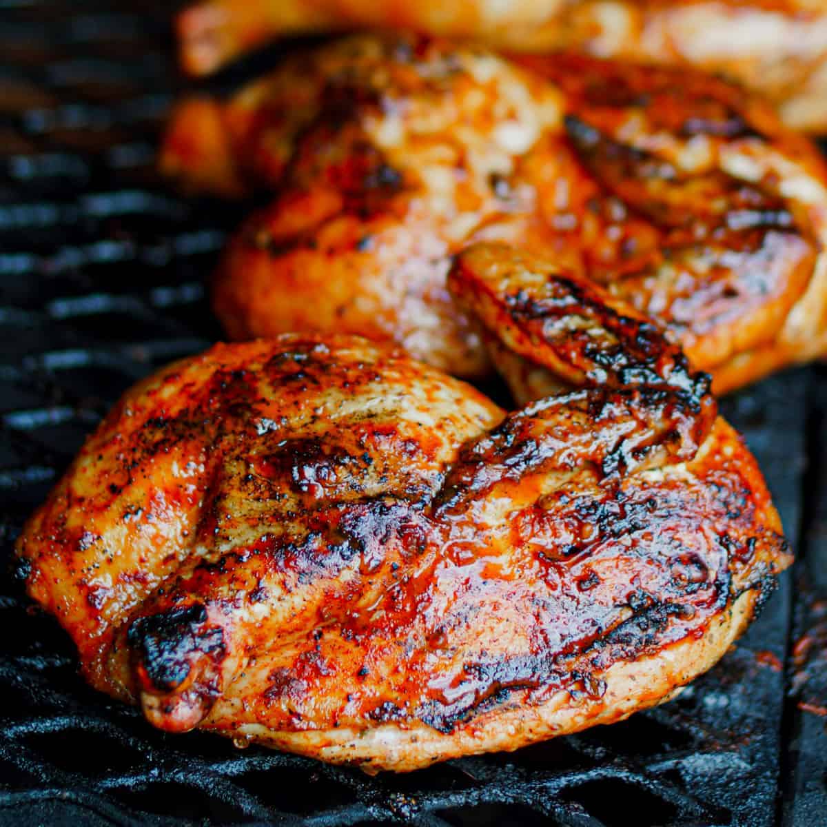 Chicken on the grill for Pollo Asado al Carbon: Mexican Grilled Charcoal Chicken