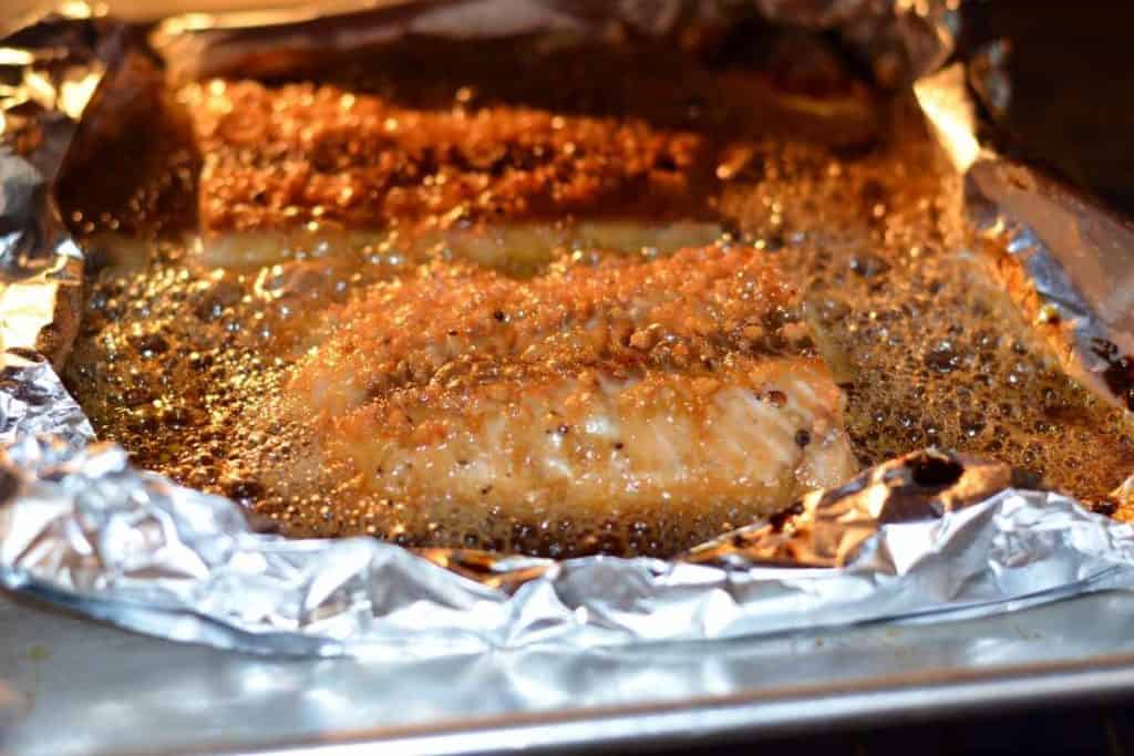 Salmon broiling with the honey teriyaki glaze on top