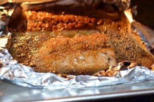 Salmon broiling with the honey teriyaki glaze on top