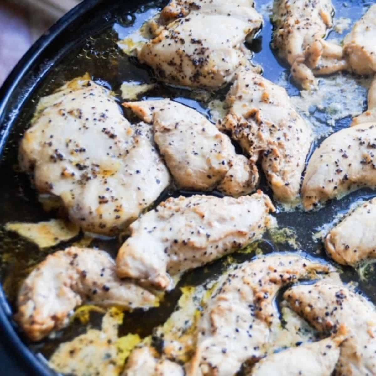 Easy Grilled Lemon Pepper Chicken in a black skillet