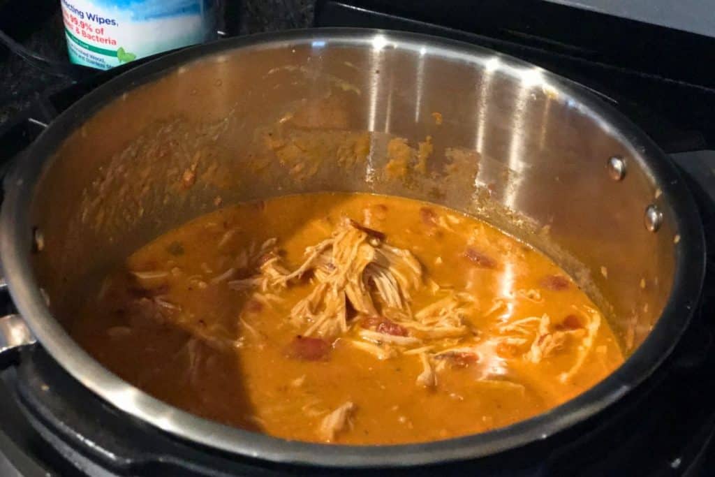 3-Jar Slow-Cooker Creamy Tomato Chicken shredded in the slow cooker after it's finished cooking