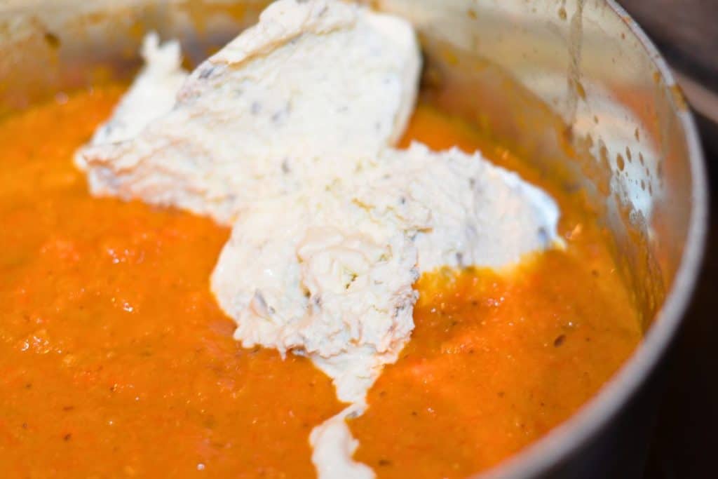 Add in herbed cream cheese to the blended sauce