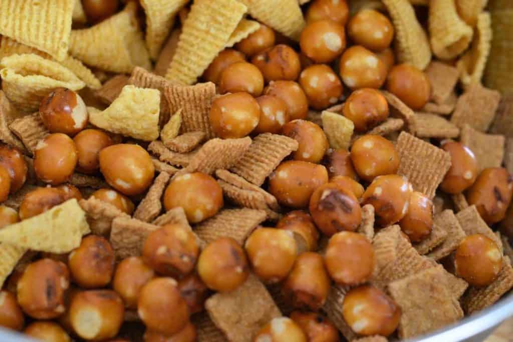 Pretzel Balls being added to the Easter Bunny Snack Mix recipe