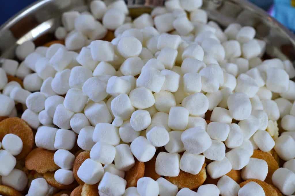 Marshmallows being added to the Easter Bunny Snack Mix recipe
