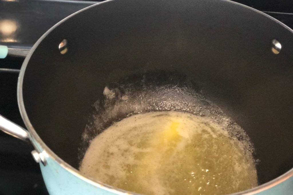 Butter melted in the bottom of the pot to prepare sauce for Smoked Cheddar Macaroni and Cheese recipe