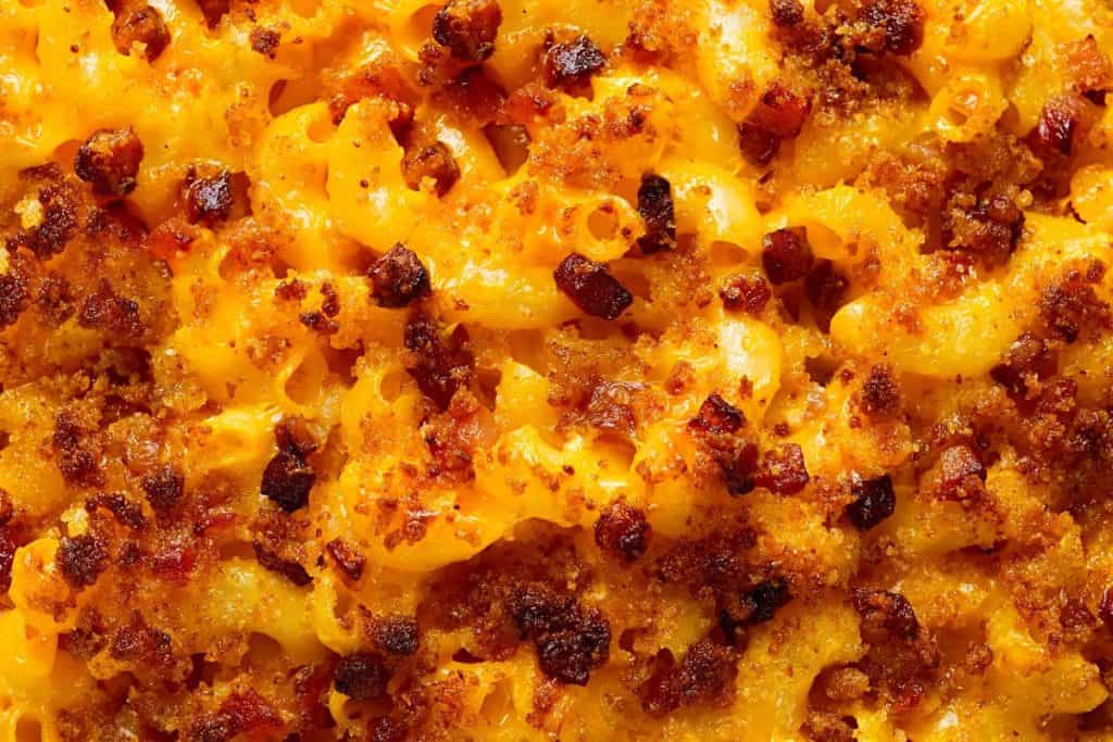 A close up of the Smoked Cheddar Macaroni and Cheese recipe with bread crumbs on top.