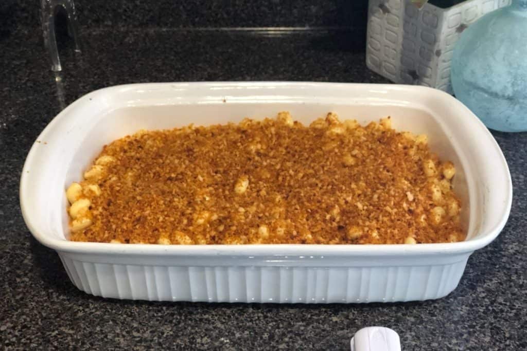 The macaroni pasta is now in a 9x13 baking dish with toasted bread crumbs sprinkled on top of the Smoked Cheddar Macaroni and Cheese recipe