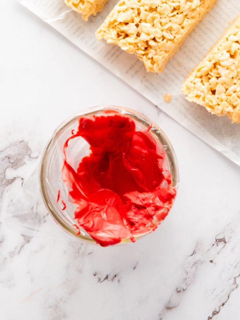 Red candy melts melted and put into a piping bag