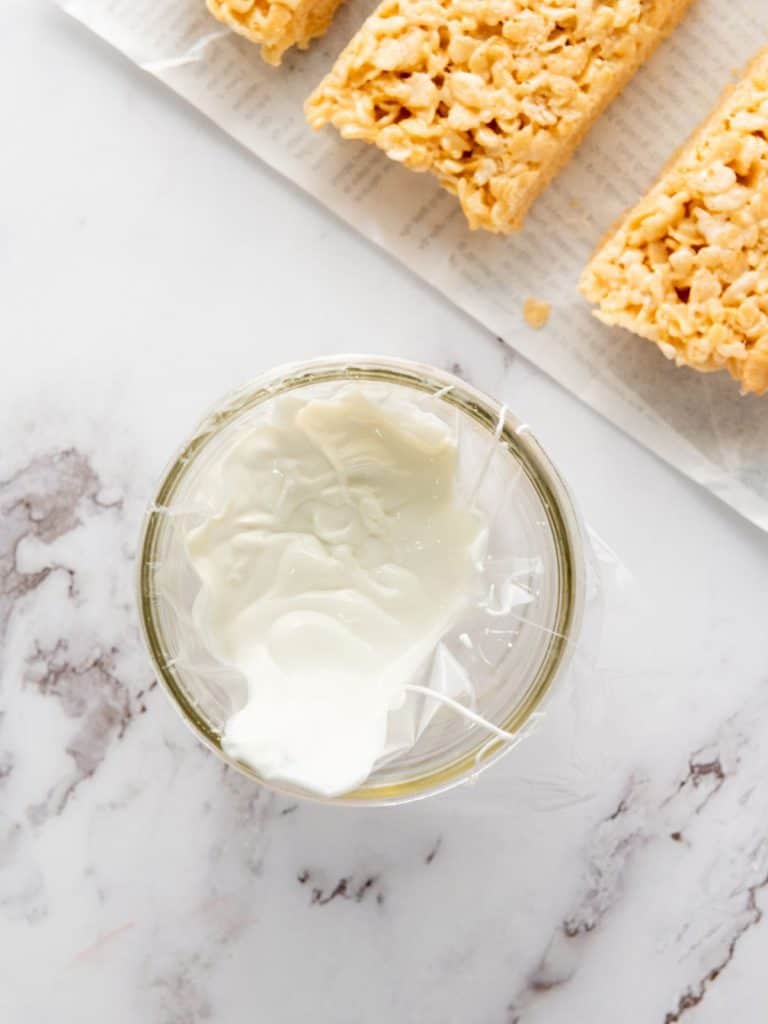 White candy melt put into a piping bag