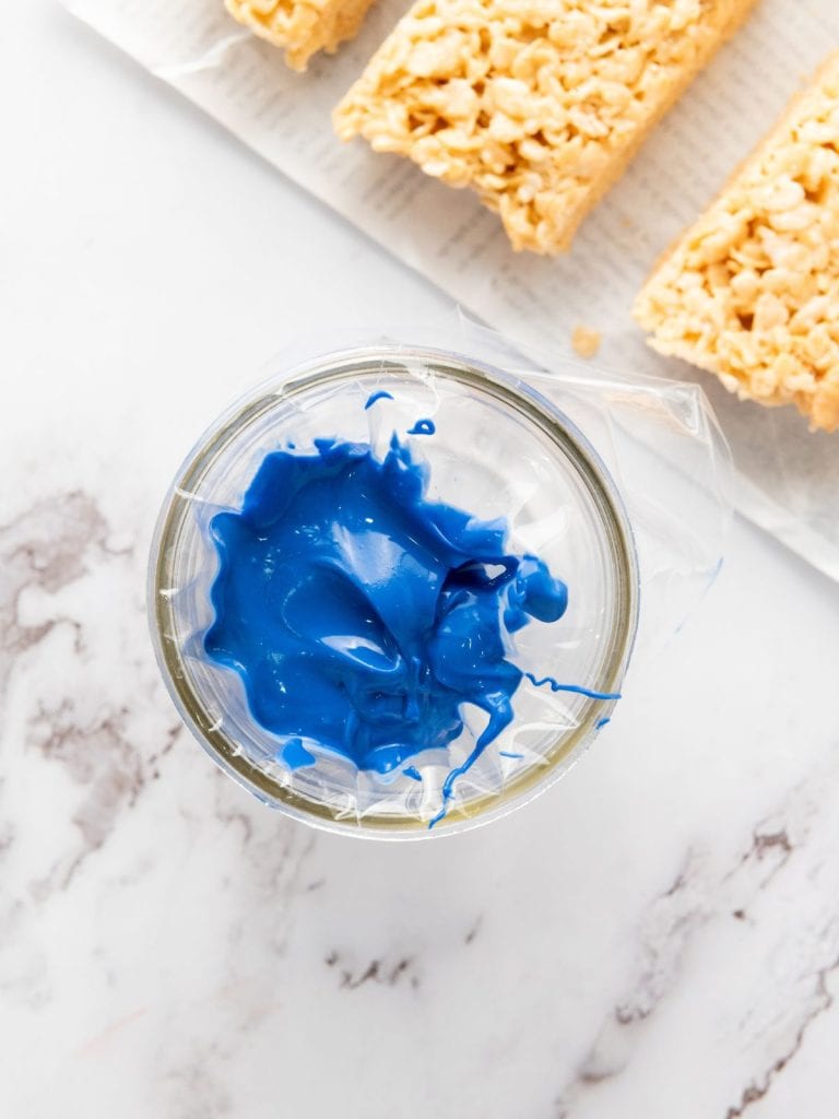 Blue cany melts put into a piping bag