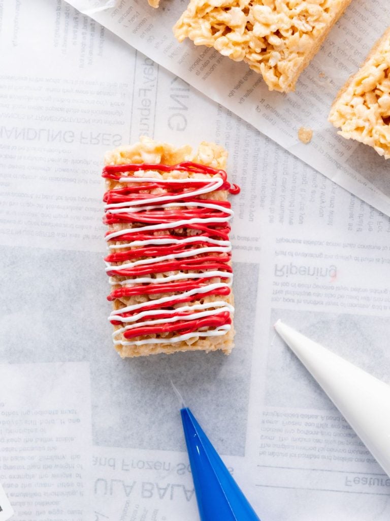 A rice krispie marshmallow treat in the process of being decorated