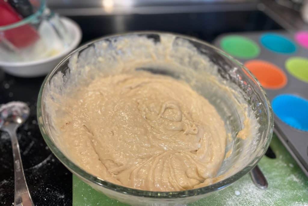 The mixed batter for Apple cinnamon streusel crumble muffins