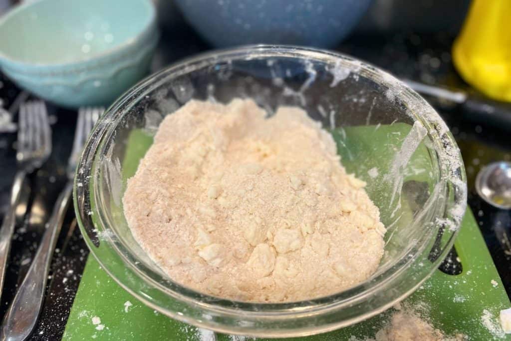 Crumble topping all mixed up in a glass bowl