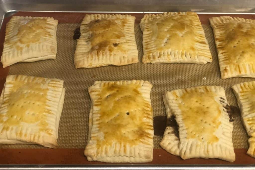 homemade brown sugar cinnamon pop tarts fresh out of the oven waiting to be iced.