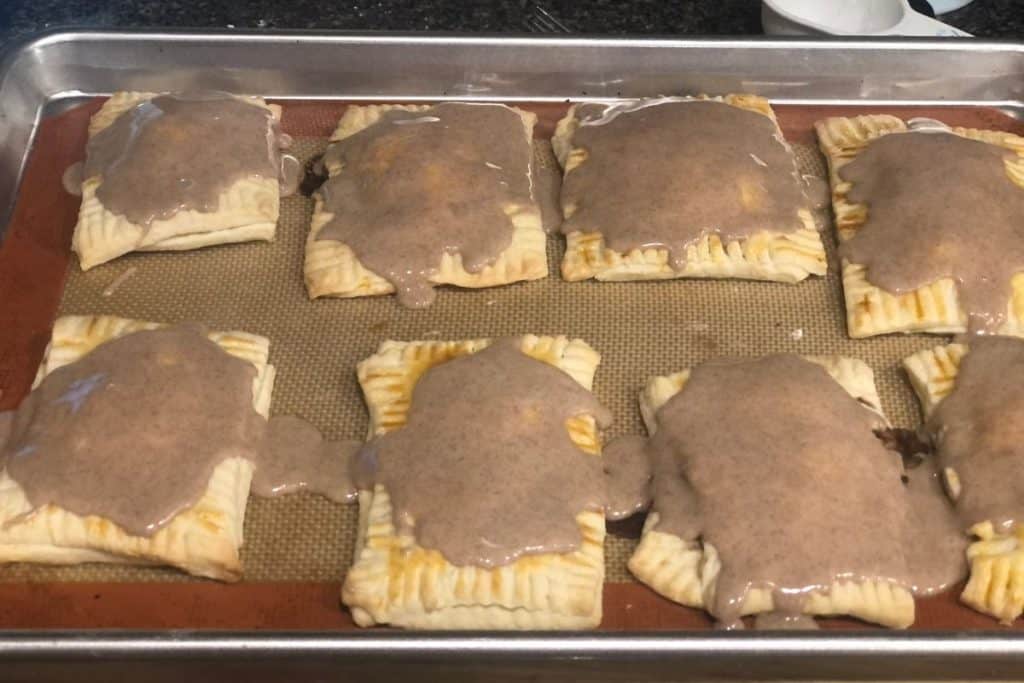 a baking sheet full of Homemade brown sugar cinnamon pop tarts