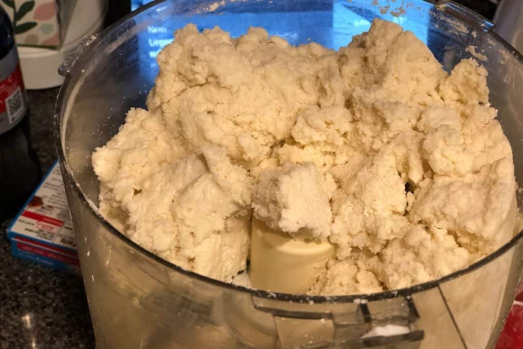 Almost ready pie dough in the food processor. It needs just a little more mixing to finish coming together.